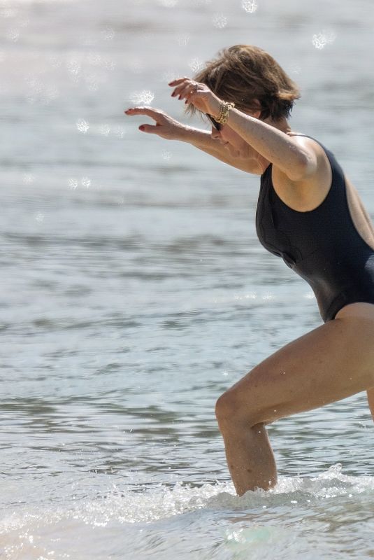EMMA FORBES in Swimsuit on the Beach at Sandy Lane Hotel in Barbados 12/22/2024