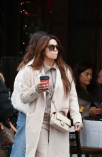 EVA LONGORIA Enjoys a Coffee while Shopping at Alo Store in Beverly Hills 12/27/2024