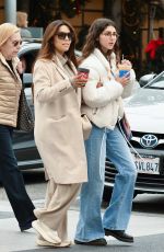 EVA LONGORIA Enjoys a Coffee while Shopping at Alo Store in Beverly Hills 12/27/2024