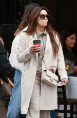 EVA LONGORIA Enjoys a Coffee while Shopping at Alo Store in Beverly Hills 12/27/2024