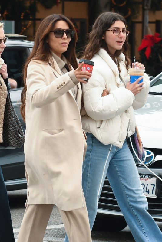 EVA LONGORIA Enjoys a Coffee while Shopping at Alo Store in Beverly Hills 12/27/2024