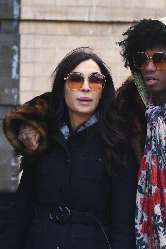 FAMKE JANSSEN Pcks on the PDA with a Mystery Man in New York 12/06/2024