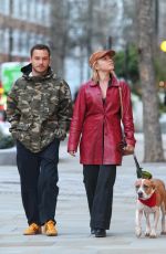 FLORENCE PUGH Enjoys a Christmas Shopping Date in London 12/18/2024