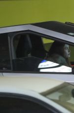 HAILEY BIEBER in a Tesla Cybertruck Leave s Studio in Los Angeles 12/04/2024