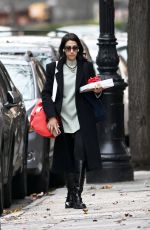 HUMA ABEDIN Out with a Christmas Gift in New York 12/19/2024