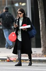 HUMA ABEDIN Out with a Christmas Gift in New York 12/19/2024