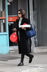 HUMA ABEDIN Out with a Christmas Gift in New York 12/19/2024