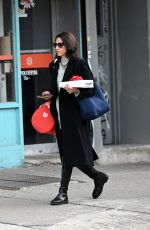 HUMA ABEDIN Out with a Christmas Gift in New York 12/19/2024