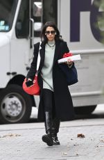HUMA ABEDIN Out with a Christmas Gift in New York 12/19/2024