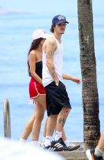 JACKIE APOSTEL and Cruz Beckham Out at Ipanema Beach in Rio de Janeiro 12/28/2024