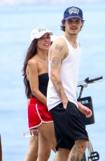 JACKIE APOSTEL and Cruz Beckham Out at Ipanema Beach in Rio de Janeiro 12/28/2024