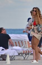 JENA FRUMES in a Red Bikini at a Beach in Miami Beach 12/21/2024