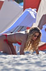 JENA FRUMES in a Red Bikini at a Beach in Miami Beach 12/21/2024