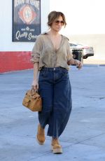 JENNIFER LOPEZ Enjoys a Candy Cane While Shopping in West Hollywood 12/01/2024
