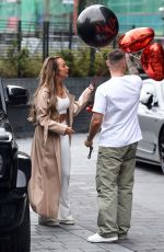 JORDI LEIGH Kissing a Mystery Man Outside Dakota Hotel in Manchester 11/18/2024