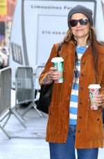 KATIE HOLMES Drinks Some Coffees Out in New York City 12/29/2024
