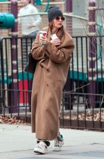 KATIE HOLMES Spotted on a Starbucks Run in New York 12/30/2024
