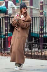 KATIE HOLMES Spotted on a Starbucks Run in New York 12/30/2024