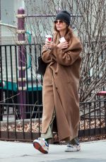 KATIE HOLMES Spotted on a Starbucks Run in New York 12/30/2024