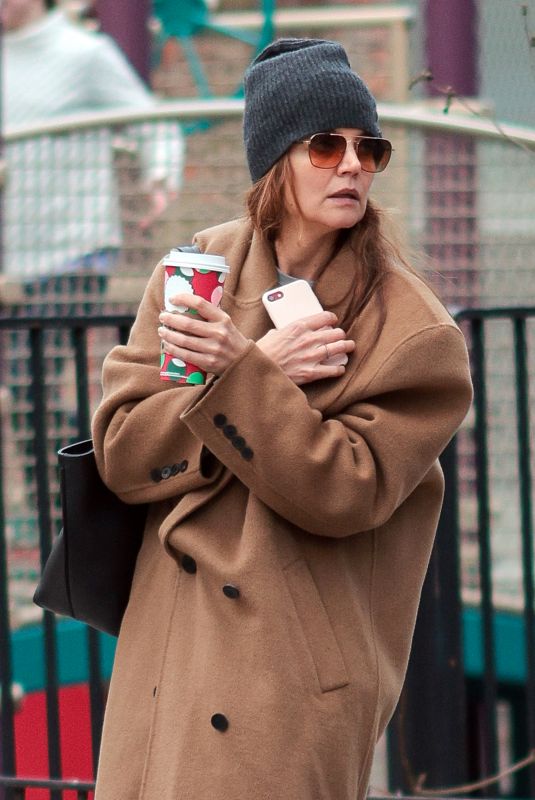 KATIE HOLMES Spotted on a Starbucks Run in New York 12/30/2024