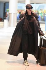 KATY PERRY and Orlando Bloom Arrives at JFK Airport in New York City 12/12/2024