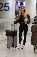 KIM ZOLCIAK Arrives at LAX Airport in Los Angeles 12/16/2024