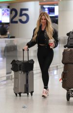 KIM ZOLCIAK Arrives at LAX Airport in Los Angeles 12/16/2024