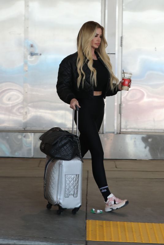 KIM ZOLCIAK Arrives at LAX Airport in Los Angeles 12/16/2024