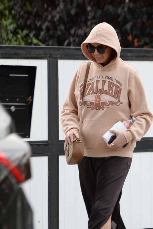 KRISTEN DOUTE Out for the First Time After Announcing Her Pregnancy in Los Angeles 11/30/2024