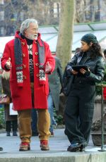 LIZA KOSHY on the Set of The Man with the Bag with Arnold Schwarzenegger, Alan Ritchson and KYLE MOONEY in Bryant Park in New York 12/19/2024