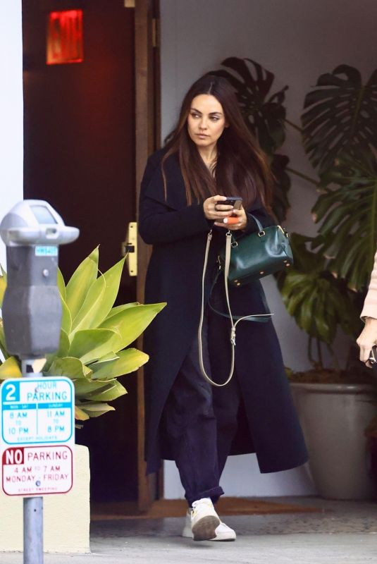 MILA KUNIS Leaves a Restaurant in West Hollywood 12/12/2024