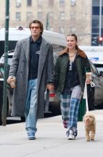 MILLIE BOBBY BROWN and Jake Bongiovi Out with Their Dog in New York 12/20/2024