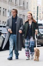 MILLIE BOBBY BROWN and Jake Bongiovi Out with Their Dog in New York 12/20/2024
