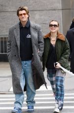 MILLIE BOBBY BROWN and Jake Bongiovi Out with Their Dog in New York 12/20/2024
