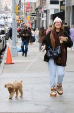 MILLIE BOBBY BROWN Out with Her Dog Winnie in New York 12/16/2024
