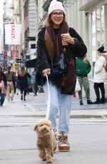 MILLIE BOBBY BROWN Out with Her Dog Winnie in New York 12/16/2024