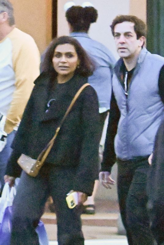 MINDY KALING Out and About at Disneyland 12/14/2024