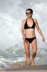 NATALIE PORTMAN in Bikini at a Beach in St Barts 12/24/2024