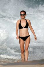 NATALIE PORTMAN in Bikini at a Beach in St Barts 12/24/2024