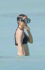 NATALIE PORTMAN in Bikini at Beach of Le Barthelemy Hotel in St. Barts 12/27/2024