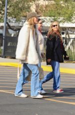 OLIVIA WILDE and JENNIFER MEYER Arrives at Baby2Baby Holiday Party in Los Angeles 12/03/2024