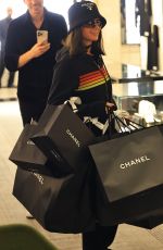 PARIS HILTON and Carter Reum Shopping at Chanel Boutique in Beverly Hills 12/23/2024