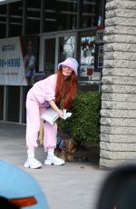 PHOEBE PRICE at a Post Office in Studio City with Her Dog Arnold 12/23/2024