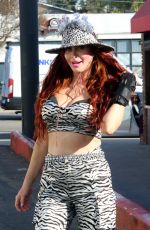 PHOEBE PRICE Out Posing in a Zebra Print Outfit in Los Angeles 12/23/2024