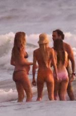 Pregnant GISELE BUNDCHEN in Bikini with Joaquim Valente at Their Family Holiday Break 12/24/2024