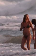 Pregnant GISELE BUNDCHEN in Bikini with Joaquim Valente at Their Family Holiday Break 12/24/2024