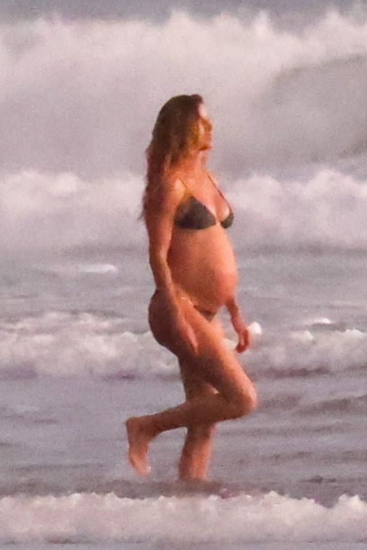 Pregnant GISELE BUNDCHEN in Bikini with Joaquim Valente at Their Family Holiday Break 12/24/2024