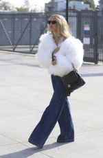 RACHEL ZOE Arrives at Baby2Baby Holiday Party in Los Angeles 12/03/2024