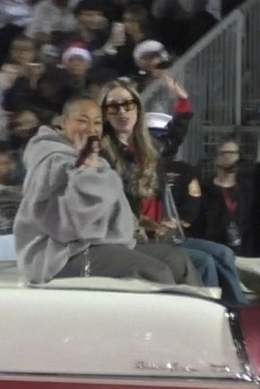 RAVEN SYMONE and MIRANDA MADAY at Hollywood Christmas Parade in Los Angeles 12/01/2024