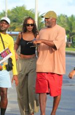 SABRINA DHOWRE and Idris ELBA at Barra da Tijuca in Rio de Janeiro 12/30/2024